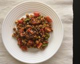 Foto del paso 7 de la receta Garbanzos salteados con verdura, semillas y cherrys