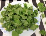 A picture of step 1 of Thankuni Pata Bora (Centella Leaves Fritters / Pakoras - Bengali Style).