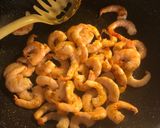 A picture of step 2 of Squid Ink Tagliolini with Grilled Shrimp, Mustard Pesto, and Toasted Pine Nuts.