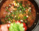 A picture of step 5 of Palm oil rice native jollof rice.