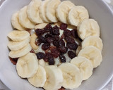 Foto del paso 5 de la receta: Gachas de avena con mix de frutos secos, uvas pasas y chocolate