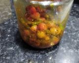 A picture of step 10 of Karonda pickle.