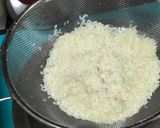 A picture of step 1 of Muri Ghonto: Bengali Yellow Rice with Fish Head.