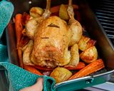 A picture of step 21 of Roast Chicken with Potatoes & Carrots.