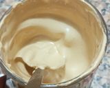 A picture of step 2 of Hand beaten fluffy coffee.