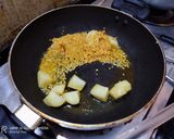A picture of step 4 of Moong Dal Diye Lau Ghonto.