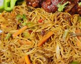 A picture of step 5 of Veg Noddles with dry manchurian balls.