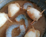 Foto del paso 13 de la receta: Calamares rellenos con langostinos Sabor Cookpad
