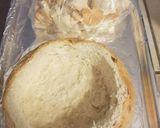 A picture of step 1 of Artichoke Cheese Bread Bowl.