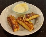 A picture of step 8 of Ham and Cheese Toasted Roll Ups.