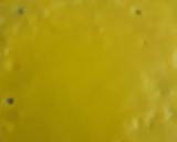 A picture of step 3 of Surul /churul appam (coconut crepe roll).
