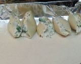 A picture of step 6 of Chicken and Broccoli Alfredo Stuffed Shells.