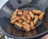 A picture of step 2 of Cinnamon Sugar Fried Bread Pops.