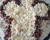 A picture of step 11 of Chocolate cake with chef's hat.