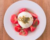 A picture of step 8 of Burrata caprese.