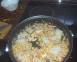 Foto del paso 2 de la receta: Arroz con bacalao, almejas y garbanzos