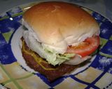 Foto del paso 4 de la receta: Sándwich de milanesa con lechuga y tomate