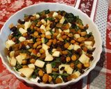 A picture of step 3 of Wilted greens with apples, raisins & nuts.