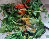 A picture of step 5 of Lasooni Dal Palak with Gondhoraj lebu/ lemon.