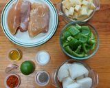 A picture of step 1 of Chicken with Potatoes and Bell Pepper in the Air Fryer.