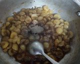 A picture of step 3 of Jhatpat khata meetha amla.