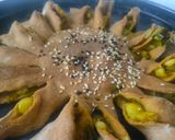 A picture of step 8 of Sunflower shaped bada pav.