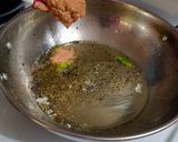 A picture of step 3 of Stuffed onion masala.
