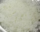 A picture of step 1 of Kerala Fried Coconut Rice.