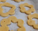 A picture of step 4 of Edible Christmas tree décor; stained glass windows biscuits.