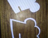 A picture of step 18 of Cookpad logo fondant cakes plain vanilla and super milk flavour.