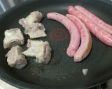 Foto del paso 3 de la receta Arroz al horno valenciano con pasas