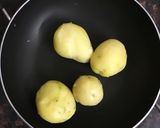 A picture of step 1 of Dahi ke Aloo.