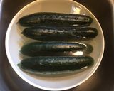 A picture of step 1 of California Farm Pickled Cucumber Spears.