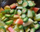 A picture of step 3 of Shukto Dal with Pumpkin, Cucumber, Korola.