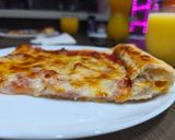 Foto del paso 14 de la receta: Pizza prosciutto con bordes rellenos de cheddar (masa en Thermomix)