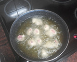 Foto del paso 4 de la receta: Habichuelas compuestas con carne de cochino, papas fritas y huevo duro