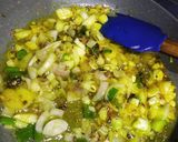 A picture of step 6 of Baingan bharta with spring onion.