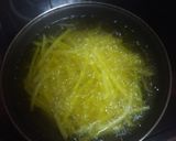 Foto del paso 5 de la receta: Bocadillo de pechuga, lechuga, tomate y papas fritas