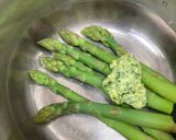 A picture of step 2 of Asparagus in wild garlic and lemon butter.