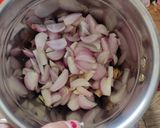 A picture of step 1 of Chicken Biryani in cooker.