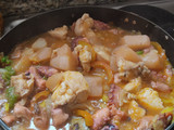 Estofado de pulpo con pepitona y pollo