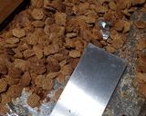 A picture of step 2 of "Puppy Chow" Snack Mix.