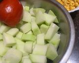 A picture of step 1 of Papaya and Chana Dal quick curry.