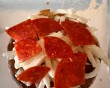 A picture of step 4 of Easy Mini English Muffin Pizzas.