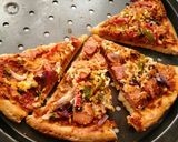 A picture of step 4 of Sausage pizza.