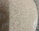 A picture of step 2 of Red raw rice unniyappam.