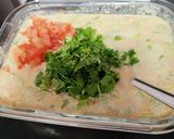 A picture of step 1 of Onion spring rava uttapam.