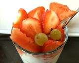 A picture of step 1 of My Yogurt with Melon,Grapes and Strawberries. 😁.
