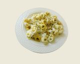 A picture of step 5 of Tortellini Pasta with white sauce.