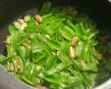A picture of step 3 of Flat Beans Rice.